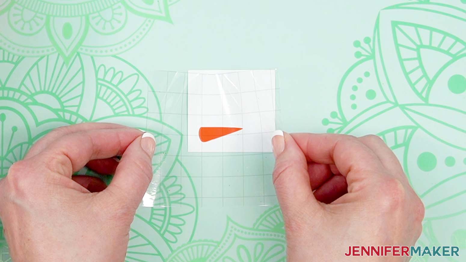 Apply the transfer tape over the orange nose piece.
