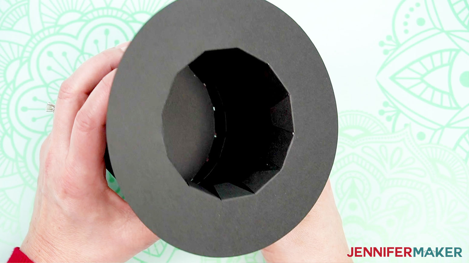 Check that the folded tabs align well inside the cylinder of the hat.