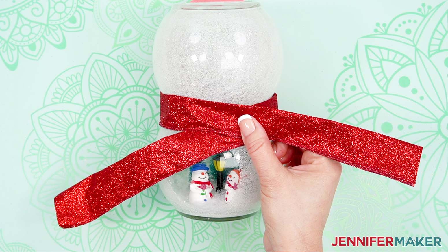 Cut a piece of wired ribbon about 30" to wrap around the snowman neck.