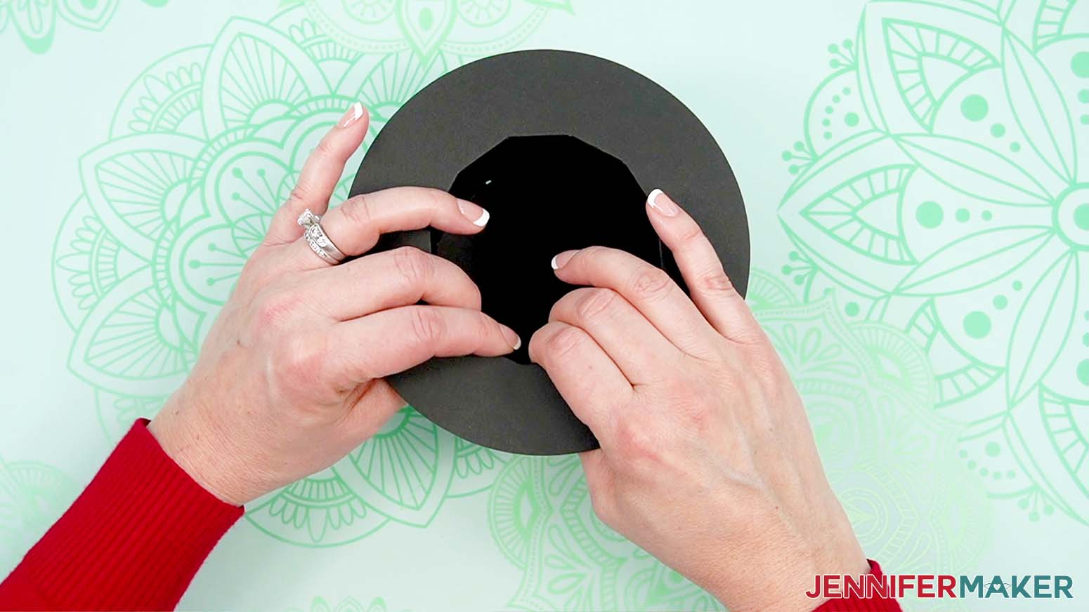 use pressure to keep tabs in place while glue dries