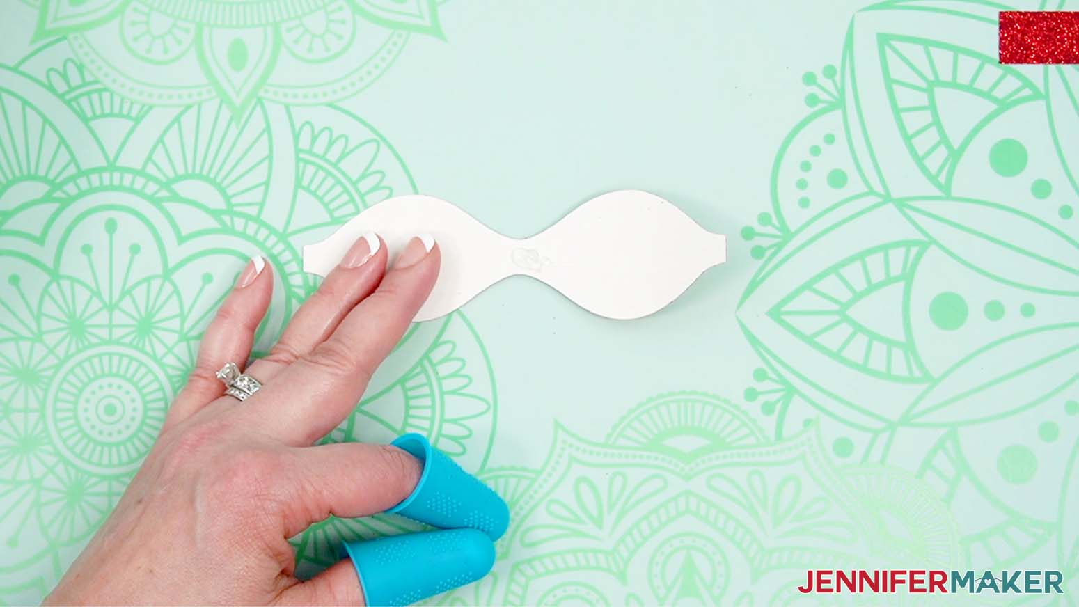 Apply glue to the ends of the back of the bowtie piece.