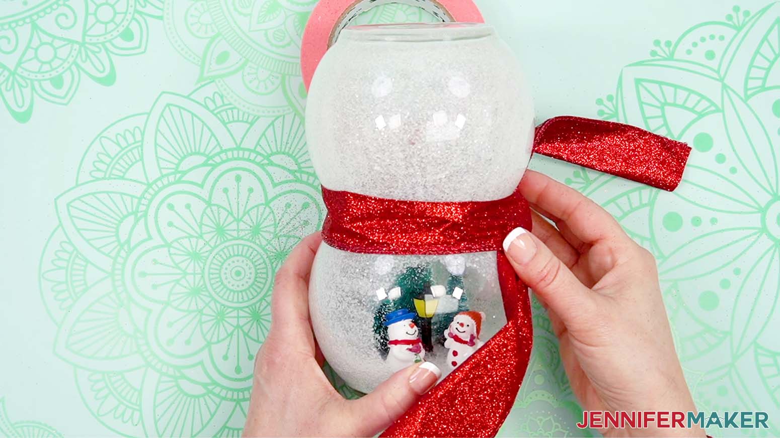 Tie the ribbon to secure as a scarf decoration.