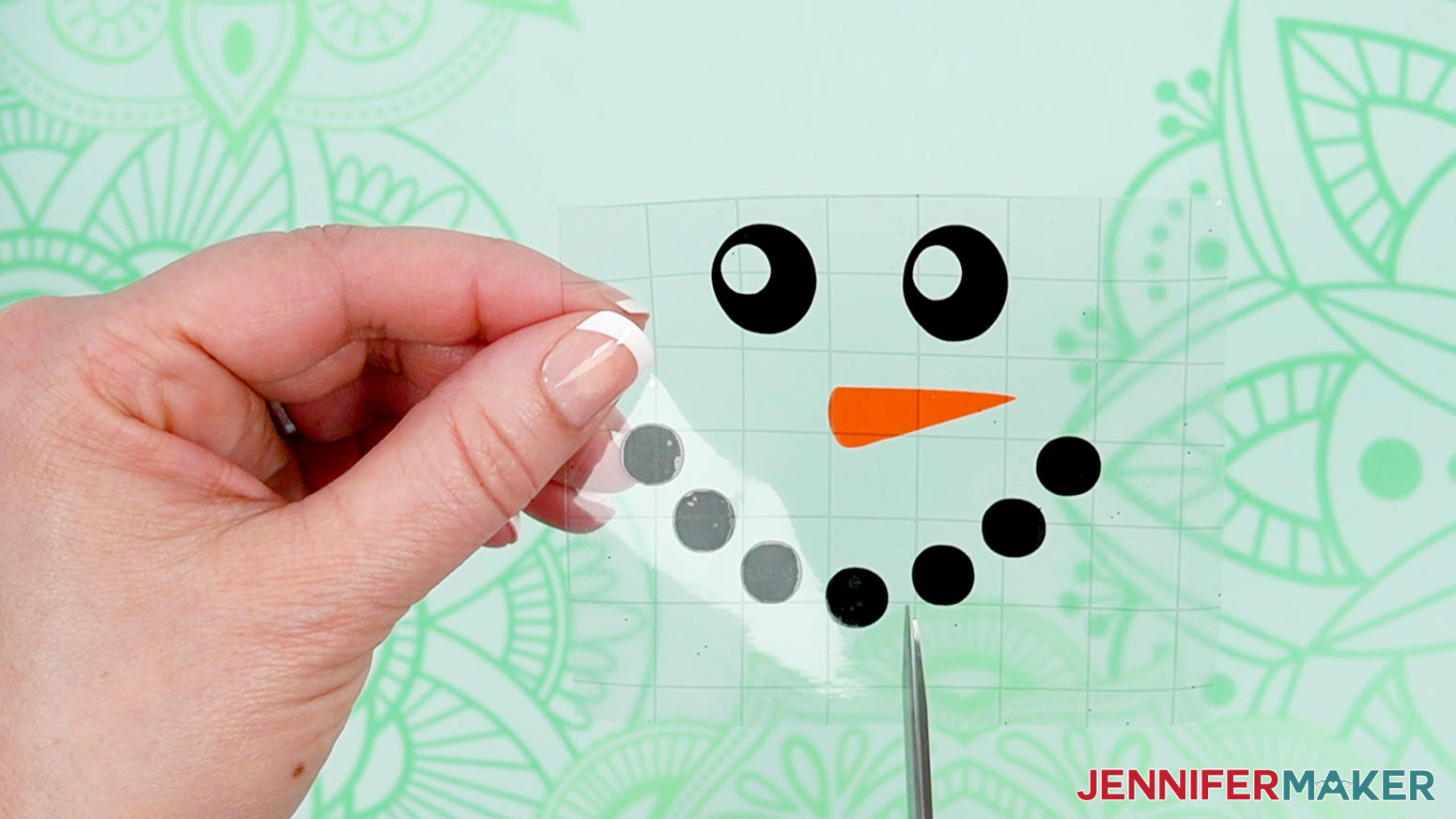 Use scissors to trim slits around the vinyl face to prepare to better adhere the vinyl to a curved surface.