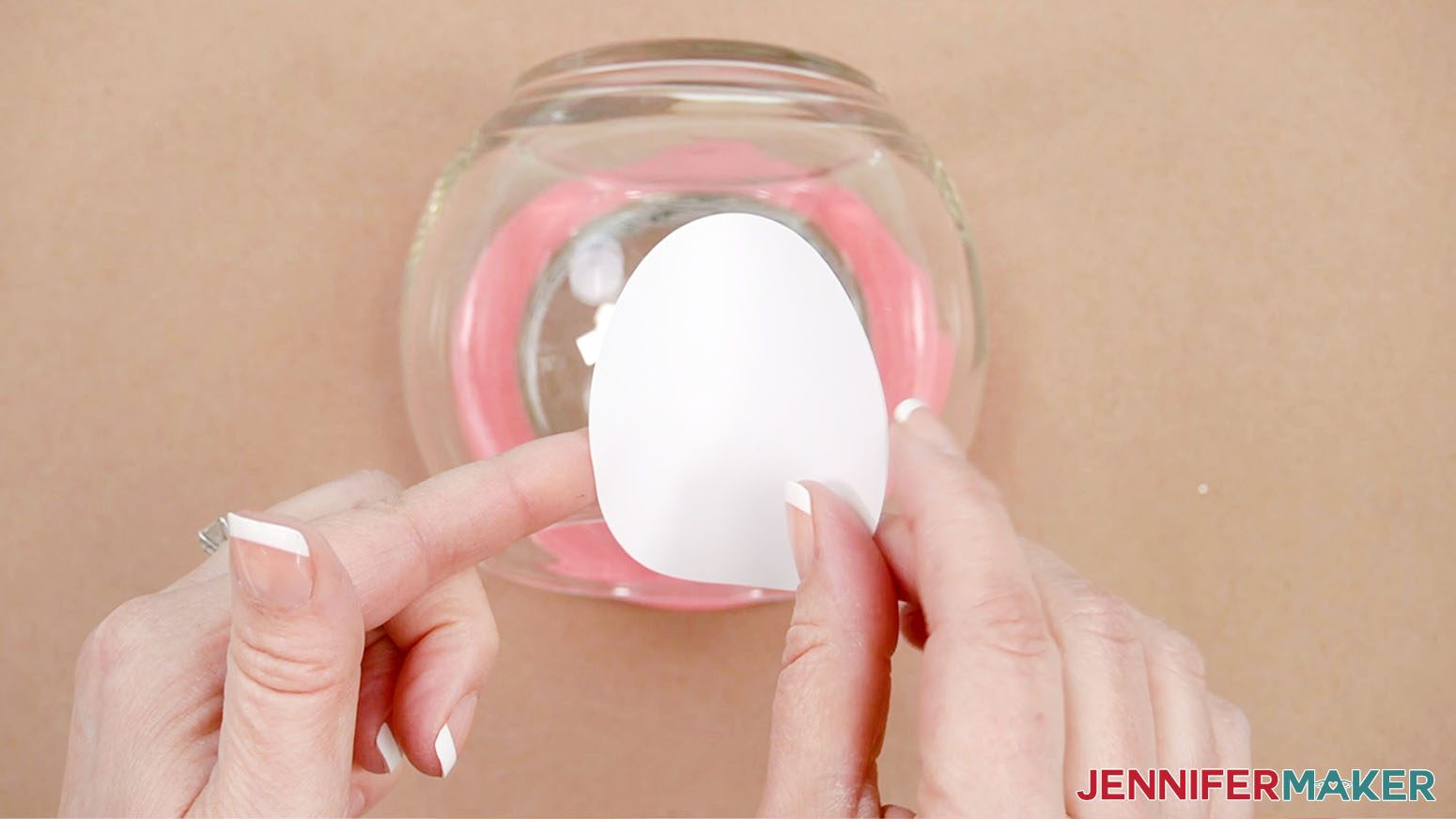 Fold the circle vinyl piece with the edges upward in a taco shape