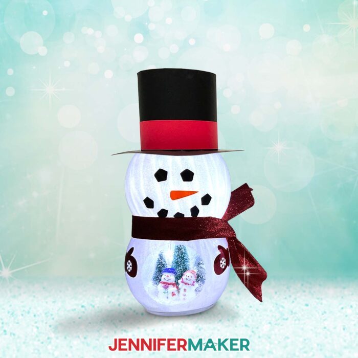 Snowman With Belly Scene of tiny snowmen inside