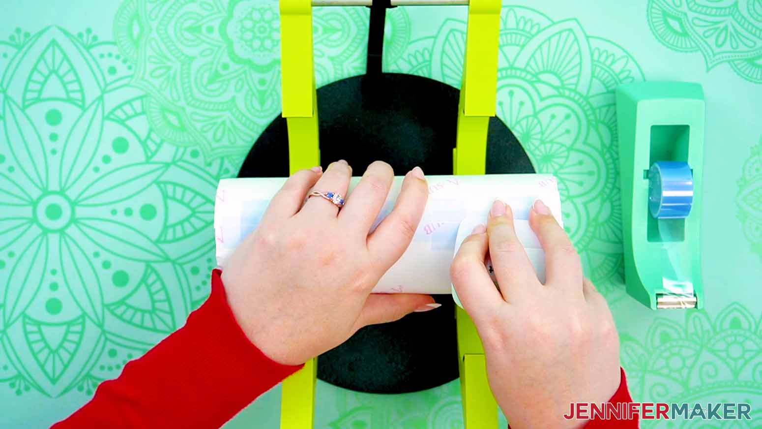 Use a scraper to push out any air bubbles along the seam under the tape.