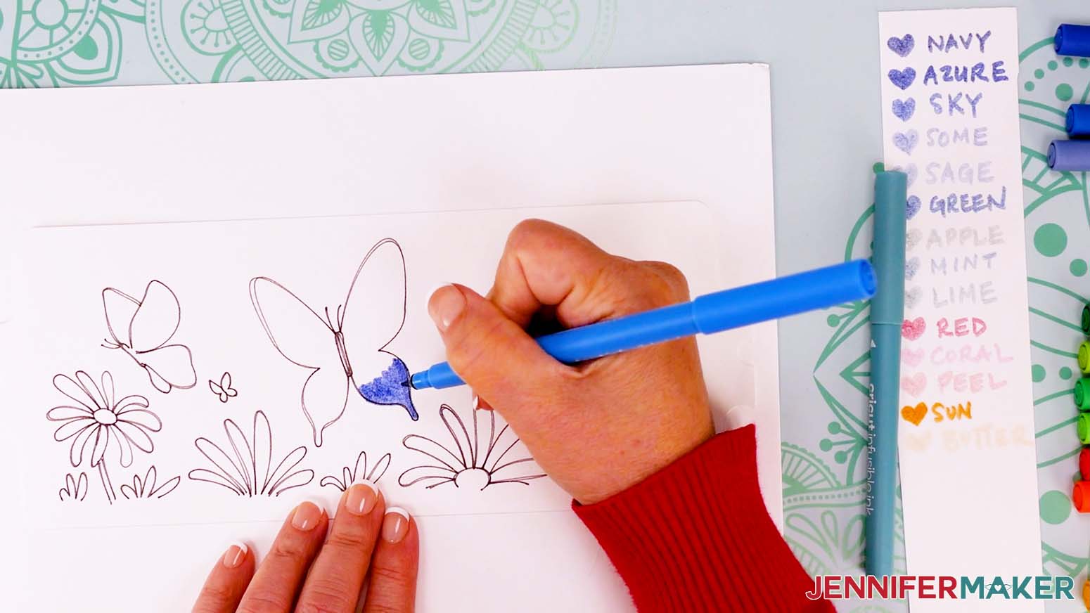 Starting with the darker ink, color the first section – like along one wing’s edge – just like a coloring book. You can add quite a bit of ink to the paper without damaging the texture, which will impact the final look on the mug.