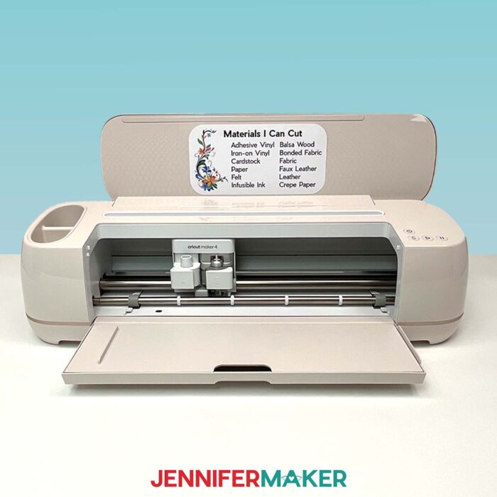 A Cricut Maker 4 with a custom material label listing the most common materials this machine can cut