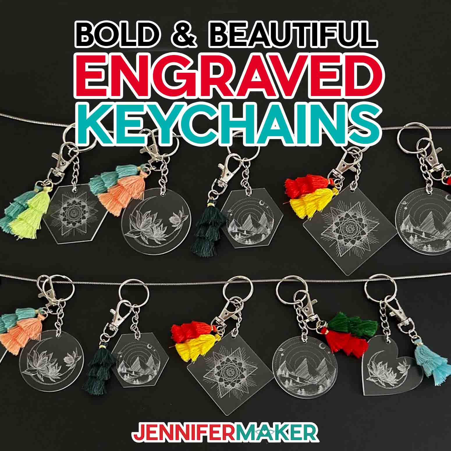 Clear acrylic engraved keychain collection with delicate designs and colorful tassels hanging on horizontal strings.