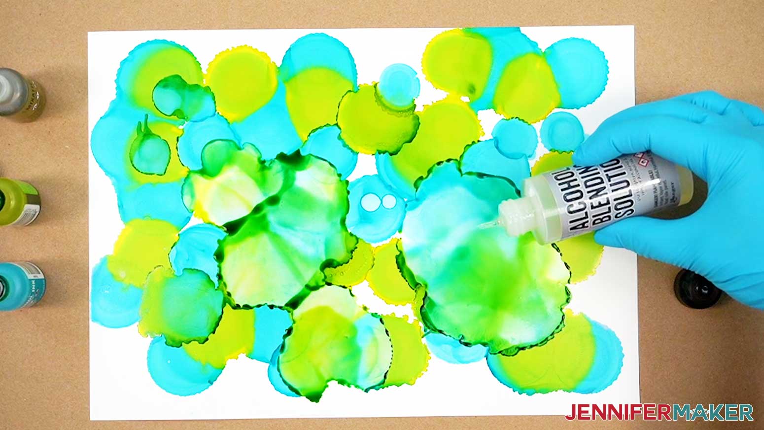 Use alcohol ink blending solution to help blend the alcohol ink colors together on the paper.