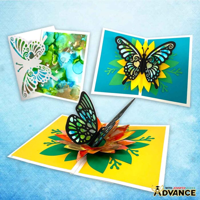 Three Alcohol Ink On Paper pop-up cards featuring intricate butterfly designs and swirling colors