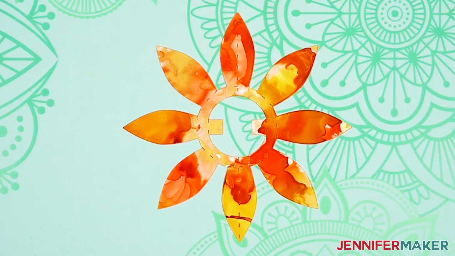 Two Joy-sized flower pieces glued together for the butterfly pop up card with alcohol ink.