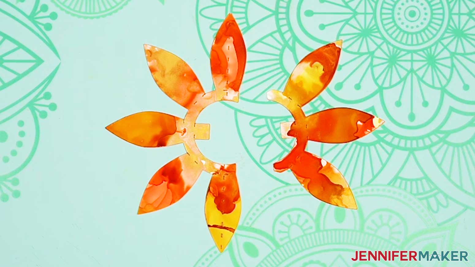 A pair of flower pieces for the Joy-sized butterfly pop up card with alcohol ink. One piece has five petals and the other has three petals.
