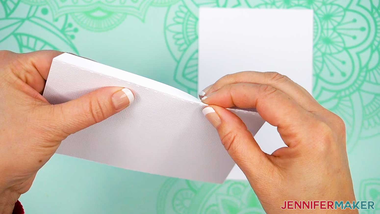 Fold the tab on the left half of the Joy-size card.