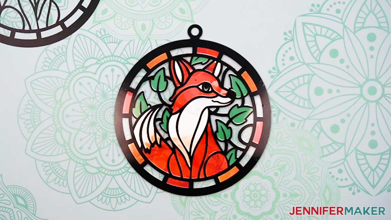 The first outer acetate and vinyl layer is adhered to the stack of paper layers for the Alcohol Ink Stained Glass design.