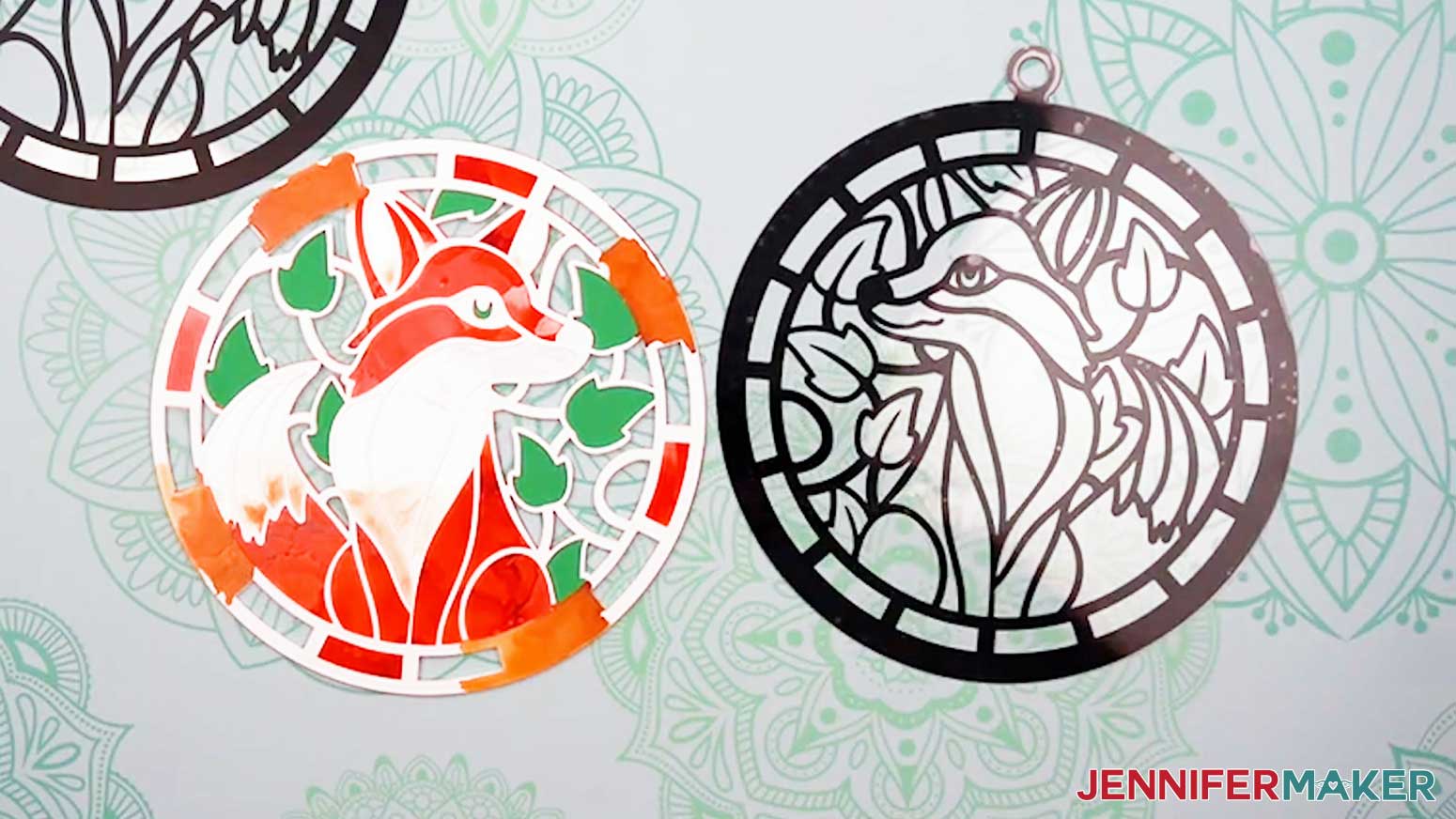 Place the acetate layer of the Alcohol Ink Stained Glass design face down with the vinyl touching the work surface.