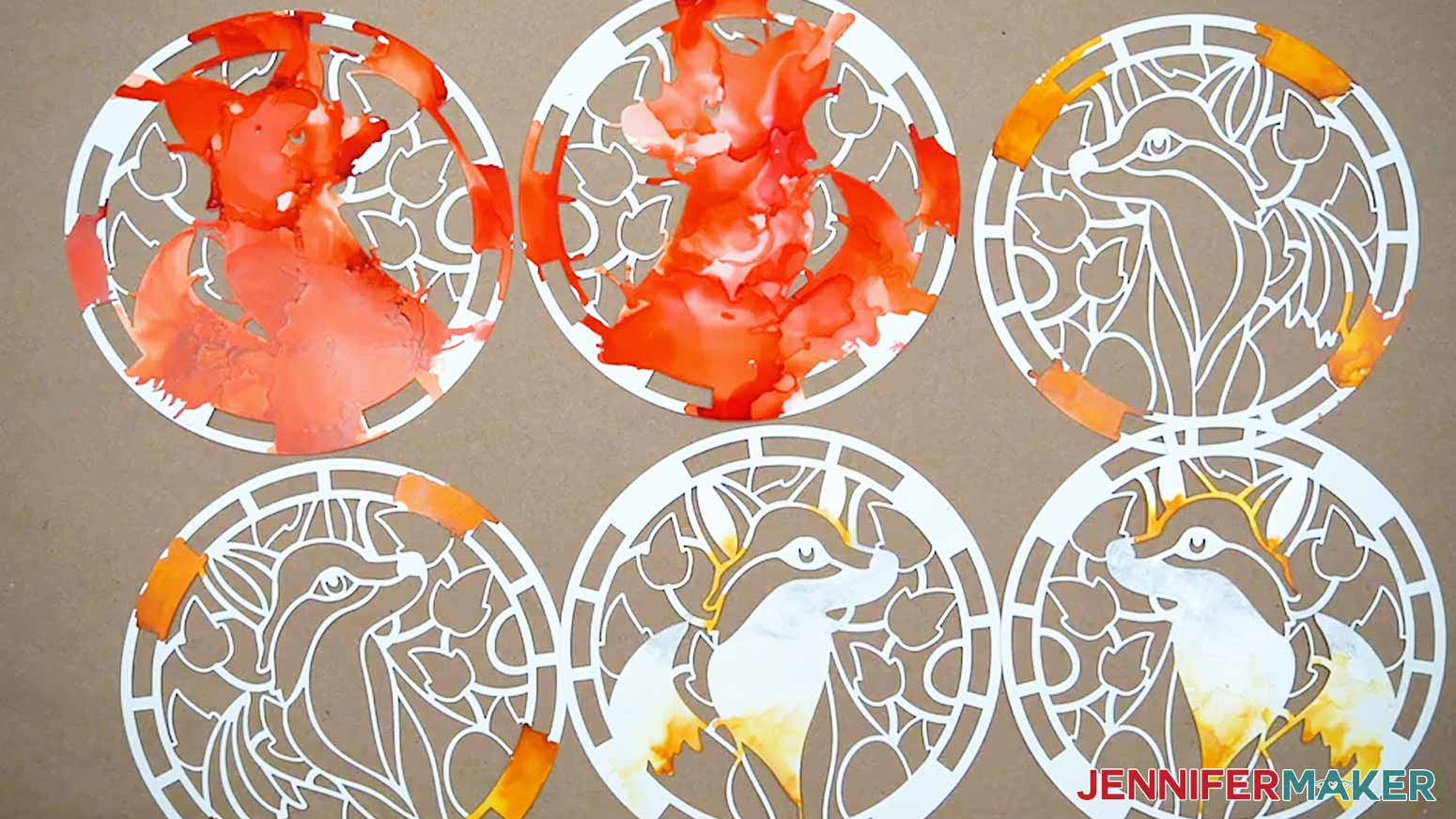 Verify all the inked layers of the Alcohol Ink Stained Glass design are inked in the correct places and allow them to fully dry before assembly.