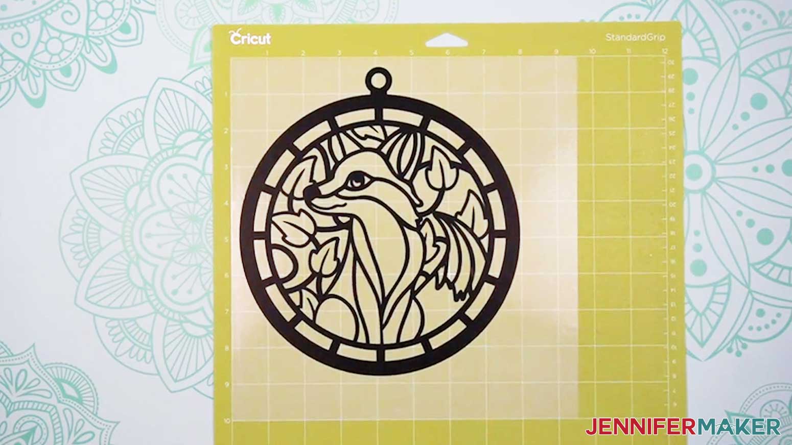 The vinyl layer of the Alcohol Ink Stained Glass design is weeded and ready to use.