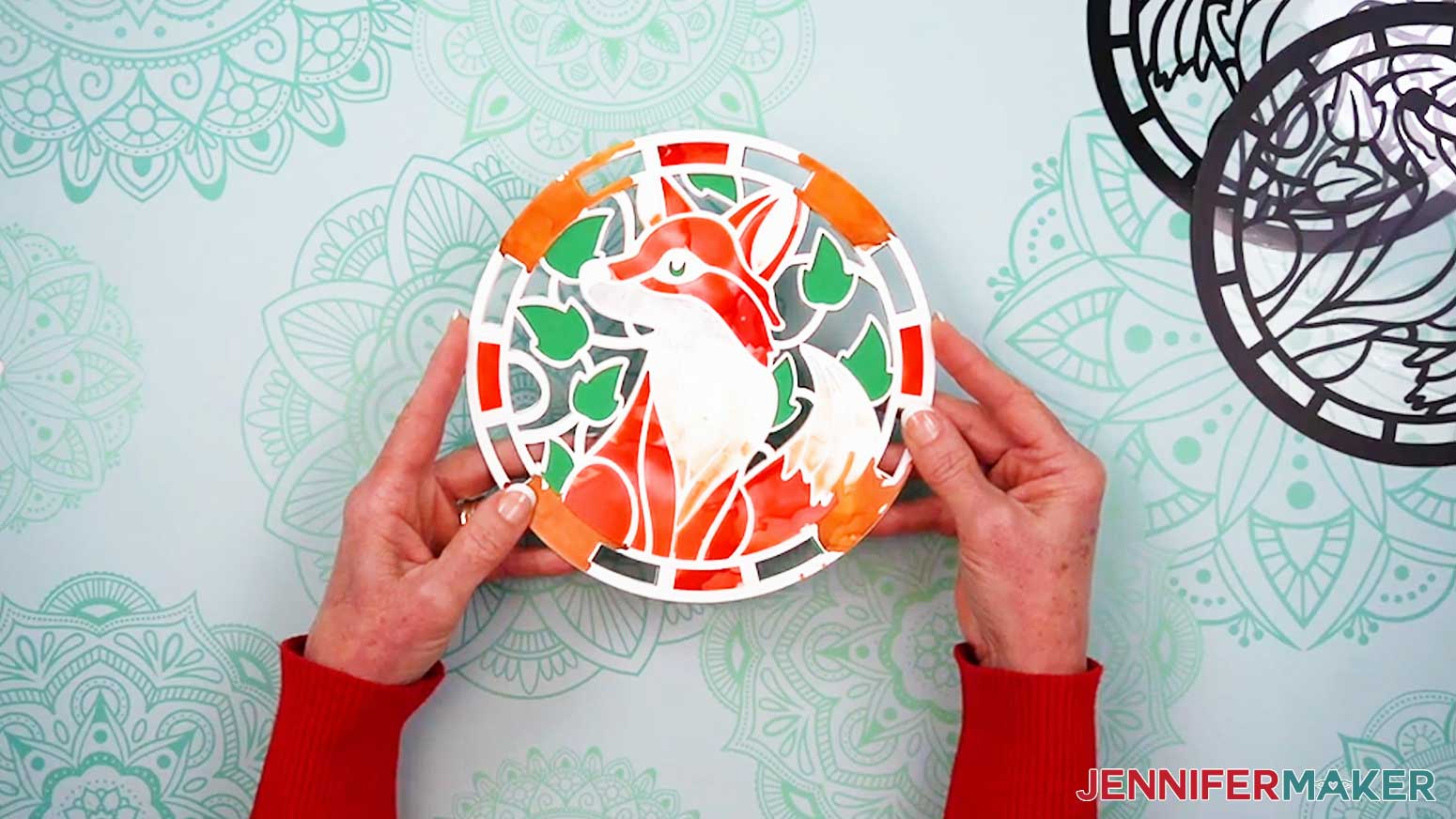 The inside paper layers of the Alcohol Ink Stained Glass design are stacked and ready to attach to the acetate and vinyl layers.