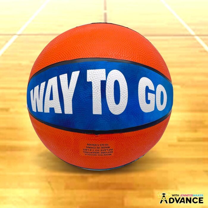 A basketball with a custom photo panel showing the words "WAY TO GO" in white on a blue background.