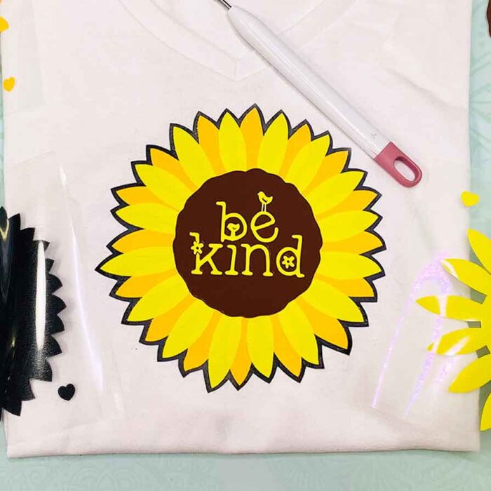 Layered Iron-On Vinyl Shirt with "Be Kind" and a Sunflower on it