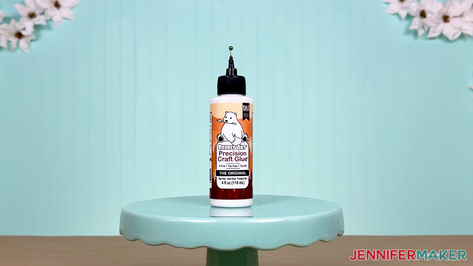 The new Bearly Art glue bottle is arranged on a display table for the Best Craft Glues test.