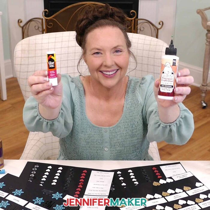 Jennifer holds up an Avery glue stick and a bottle of Bearly Art glue.
