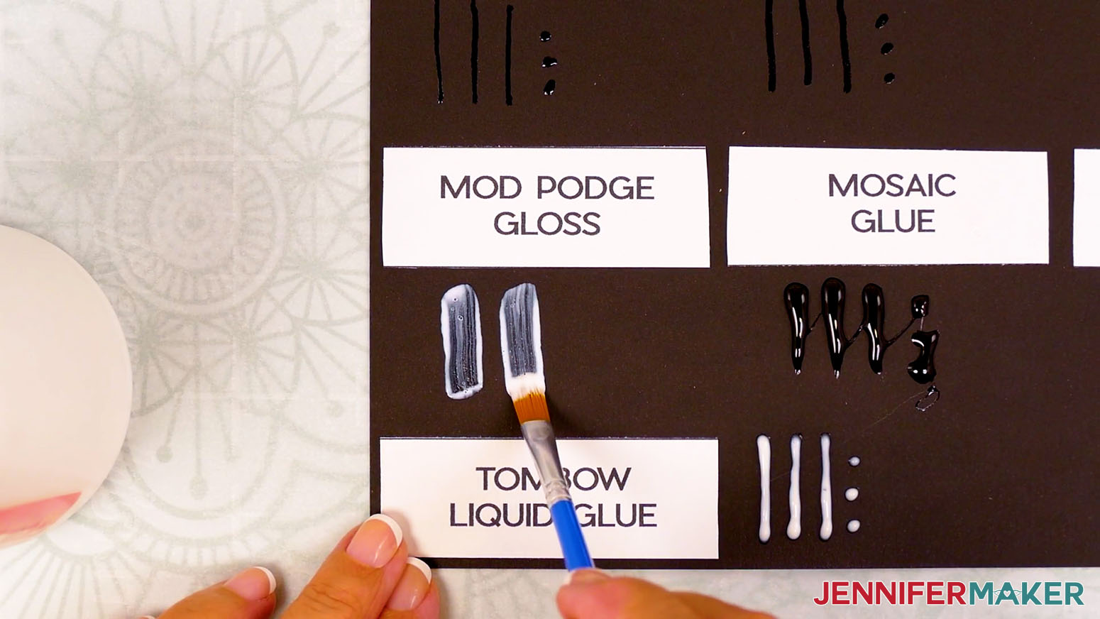 A brush is used to spread the Mod Podge Gloss glue used for the Best Craft Glues tests.