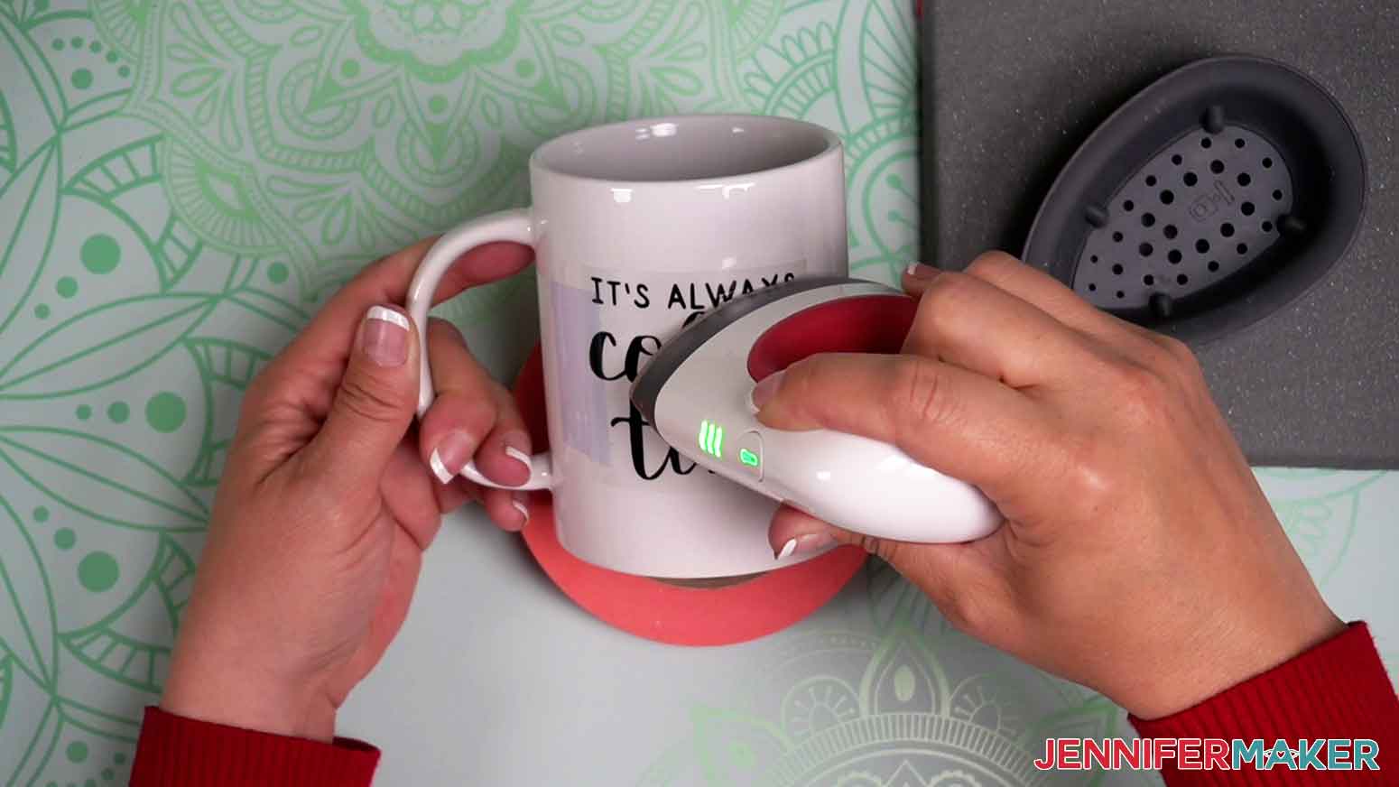 Use a Cricut EasyPress Mini on high heat to adhere the decal to the ceramic coffee mug.