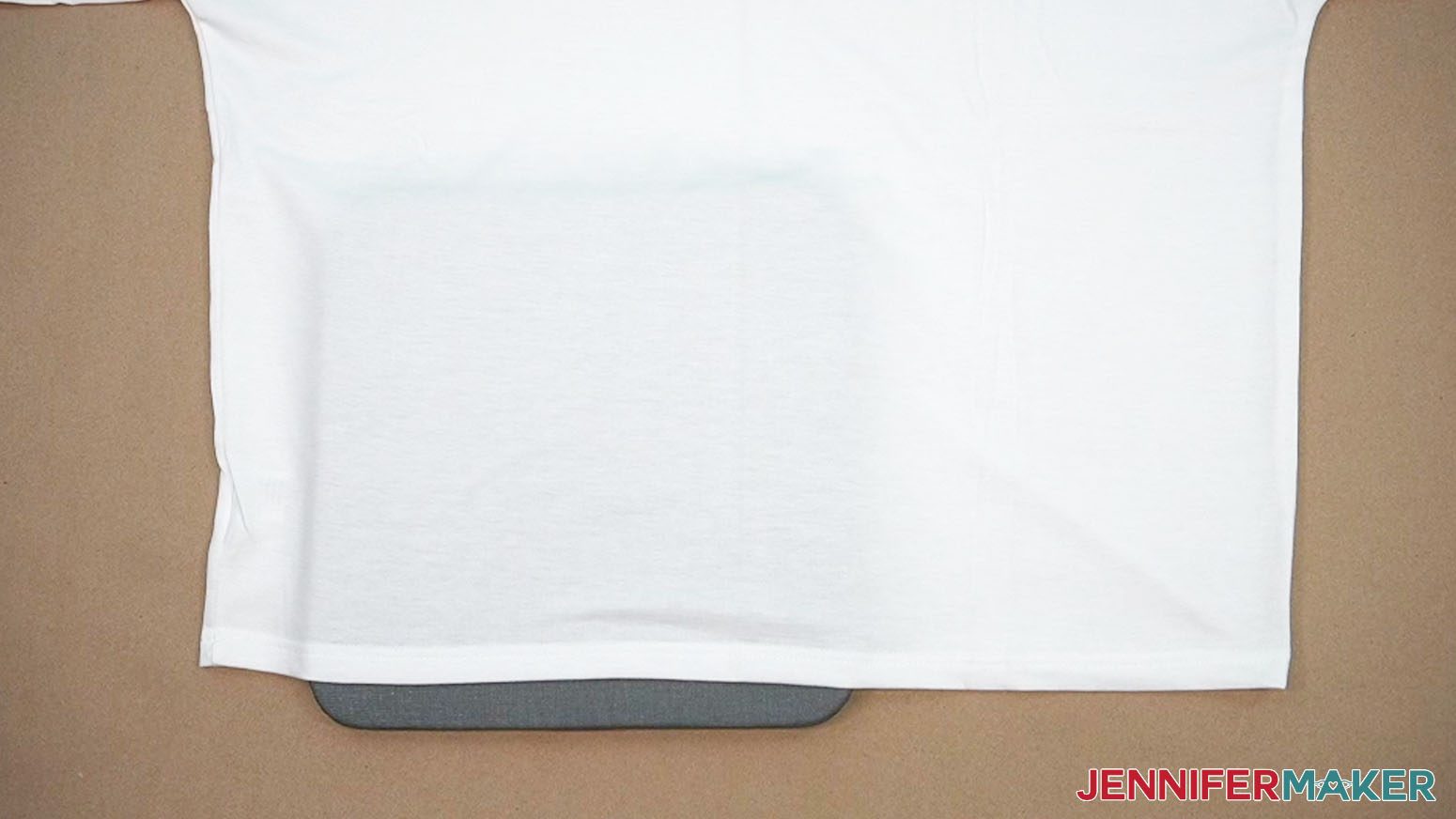 Place a pressing mat under the area of the material that will be pressed.