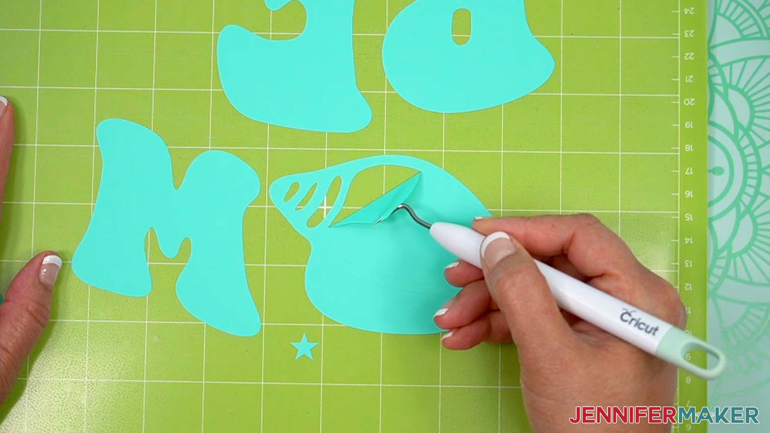 Use a weeding tool to help remove the unnecessary areas of the cut heat transfer vinyl design.