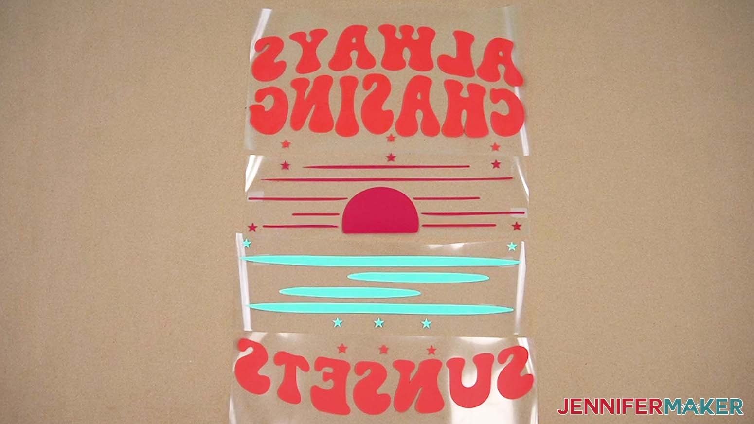 The separate pieces of the Always Chasing Sunsets design are weeded and ready to apply to the hoodie.