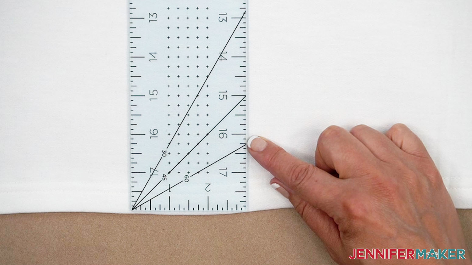 Measure at least one inch from the bottom seam to make sure the design does not get to close to the edge.