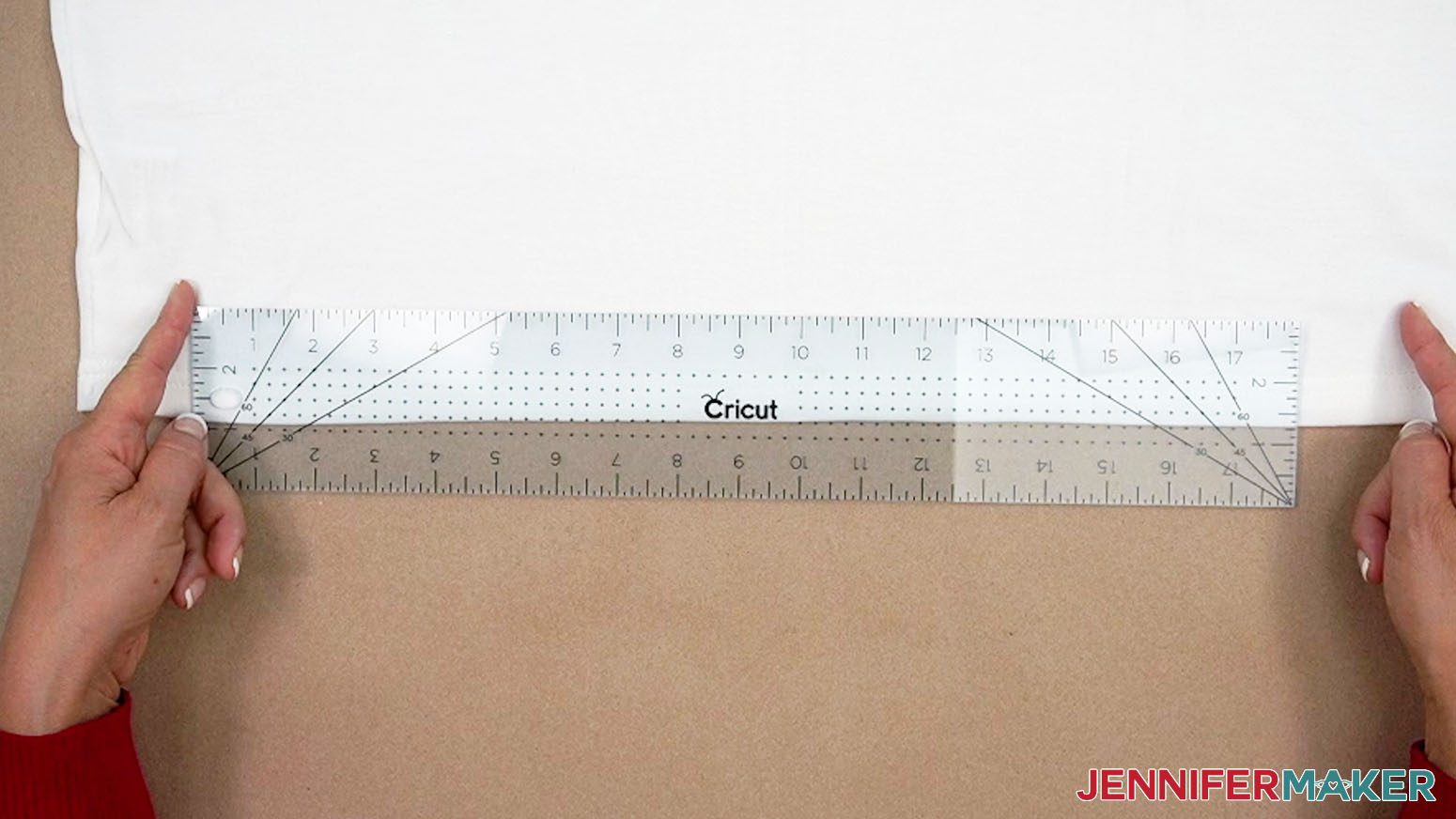 Measure the narrowest part of the hoodie to determine the maximum width allowed for your big HTV design.