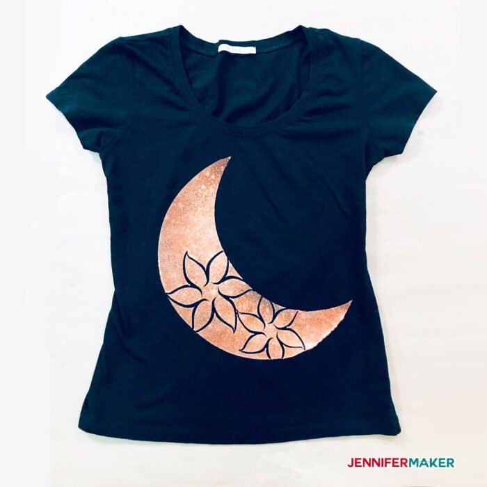 A pretty black bleach stencil shirt with a moon flower design