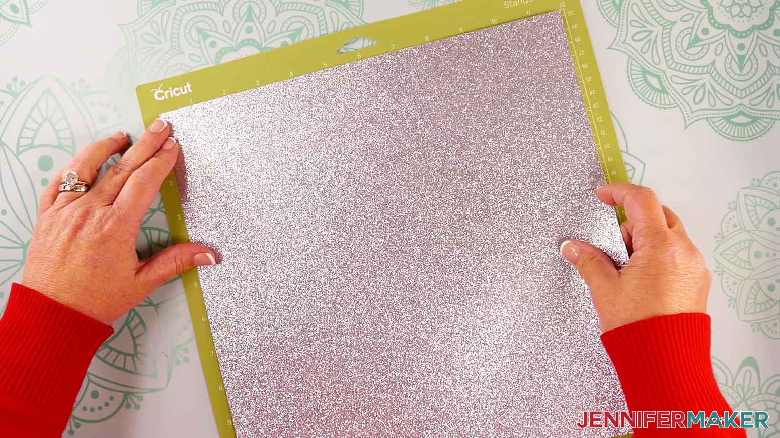 Place your first mat’s cardstock face up on a green StandardGrip machine mat - my first mat is glitter cardstock.