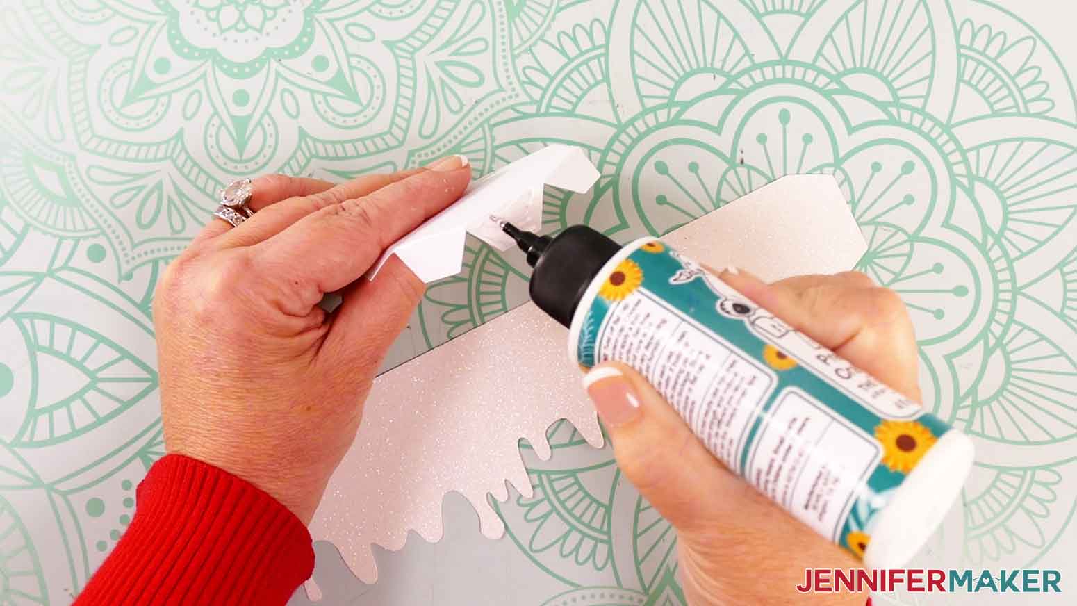 For the candle box lid, add glue to the outside tab of the lid's base piece.