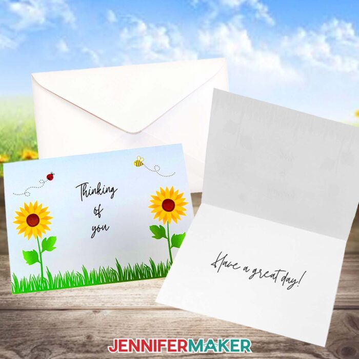 A folding card with sunflowers, a bee, a ladybug, and "Thinking Of You" printed on the front floats against a clear blue sky. "Thinking Of You!" is printed on the inside. Learn to make your own with the How To Make Cards In Canva tutorial