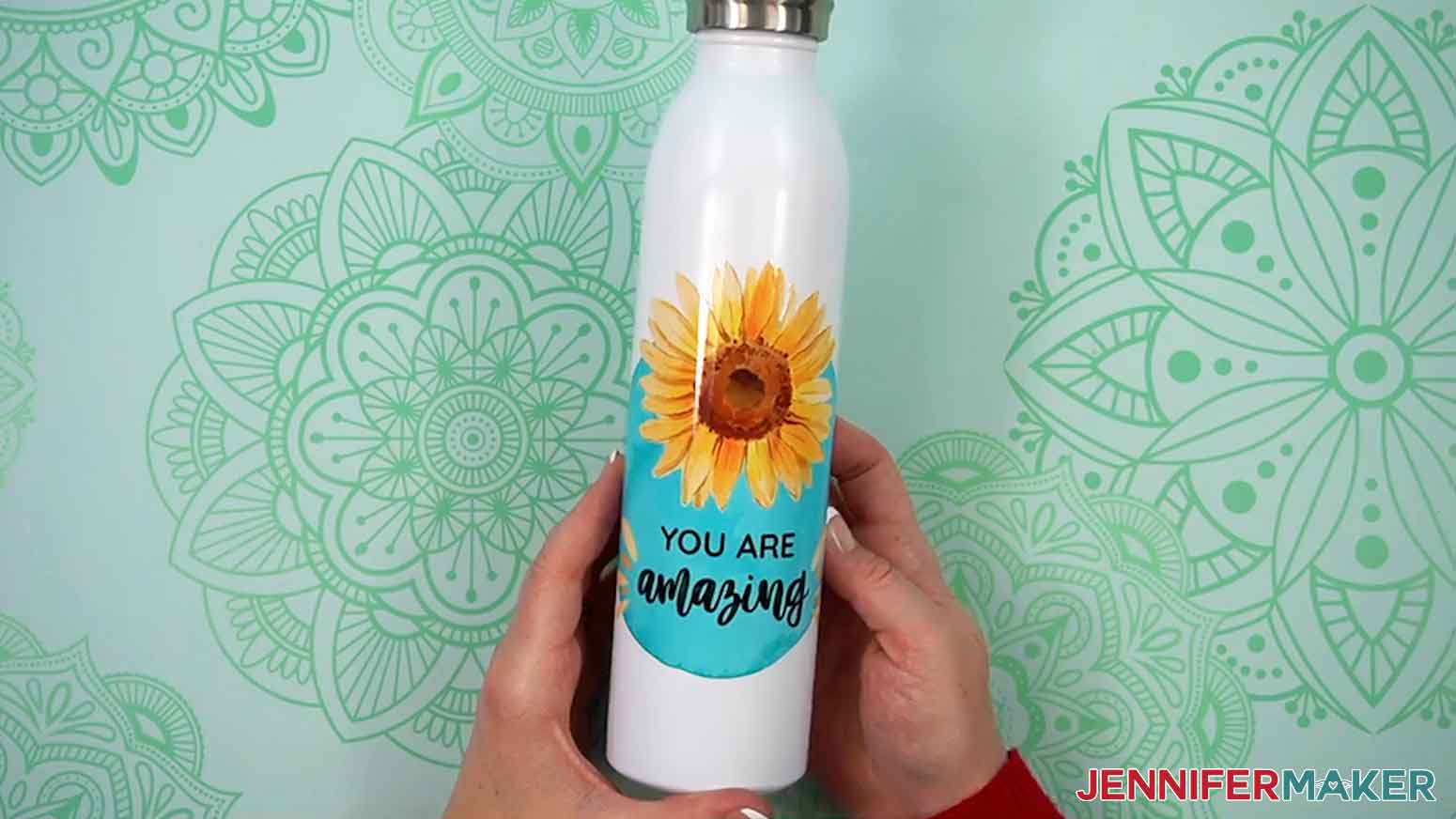 Canva gifts white insulated tumbler with the "you are amazing" sunflower design.