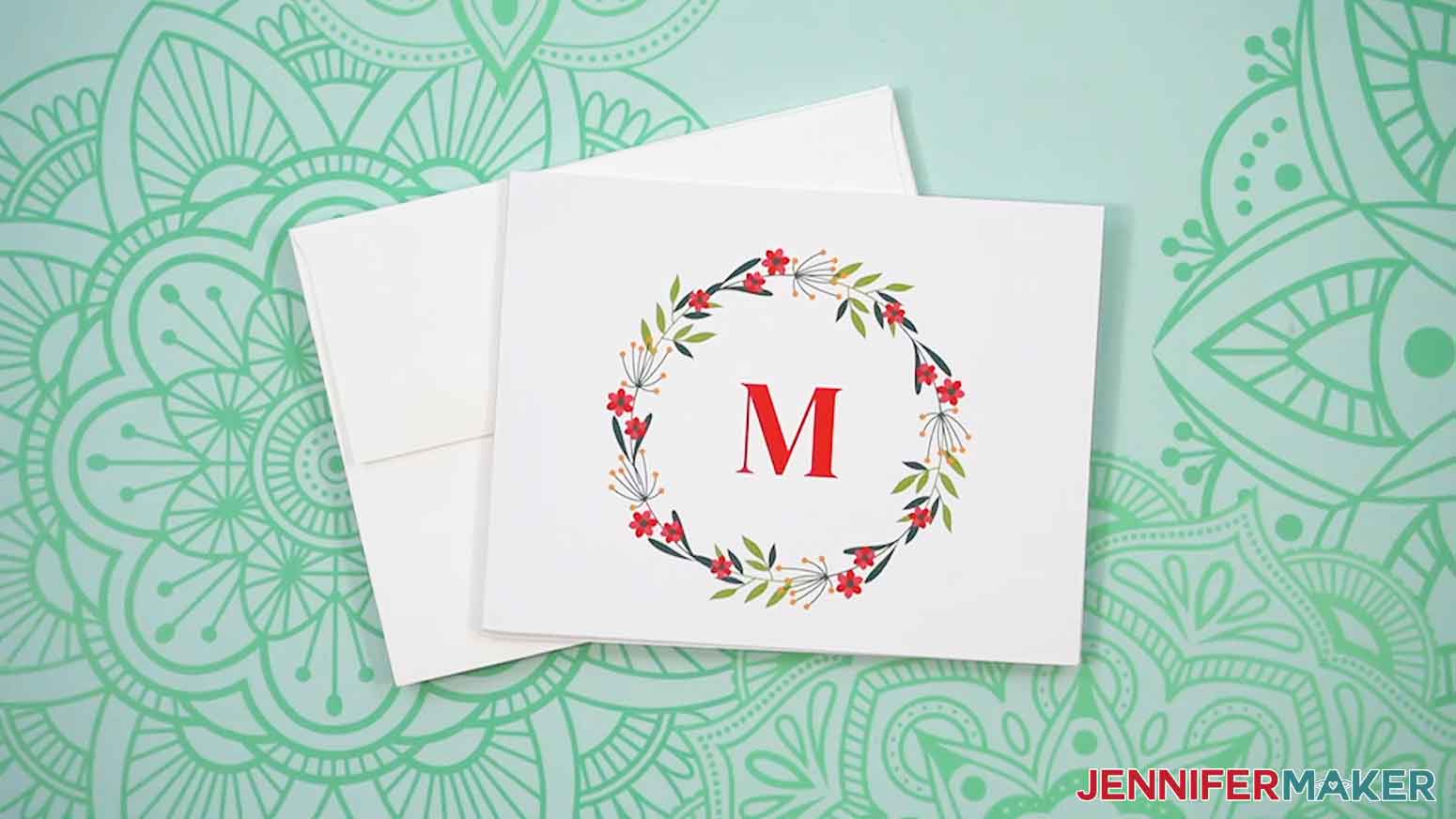 Canva note card with monogram wreath design.