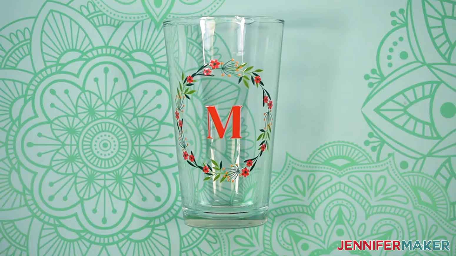 Canve gifts clear pint glass with the monogram wreath design.