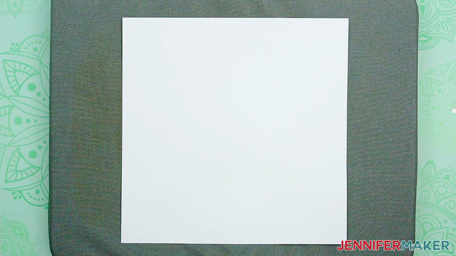 Place a sheet of blowout paper on the pressing mat.