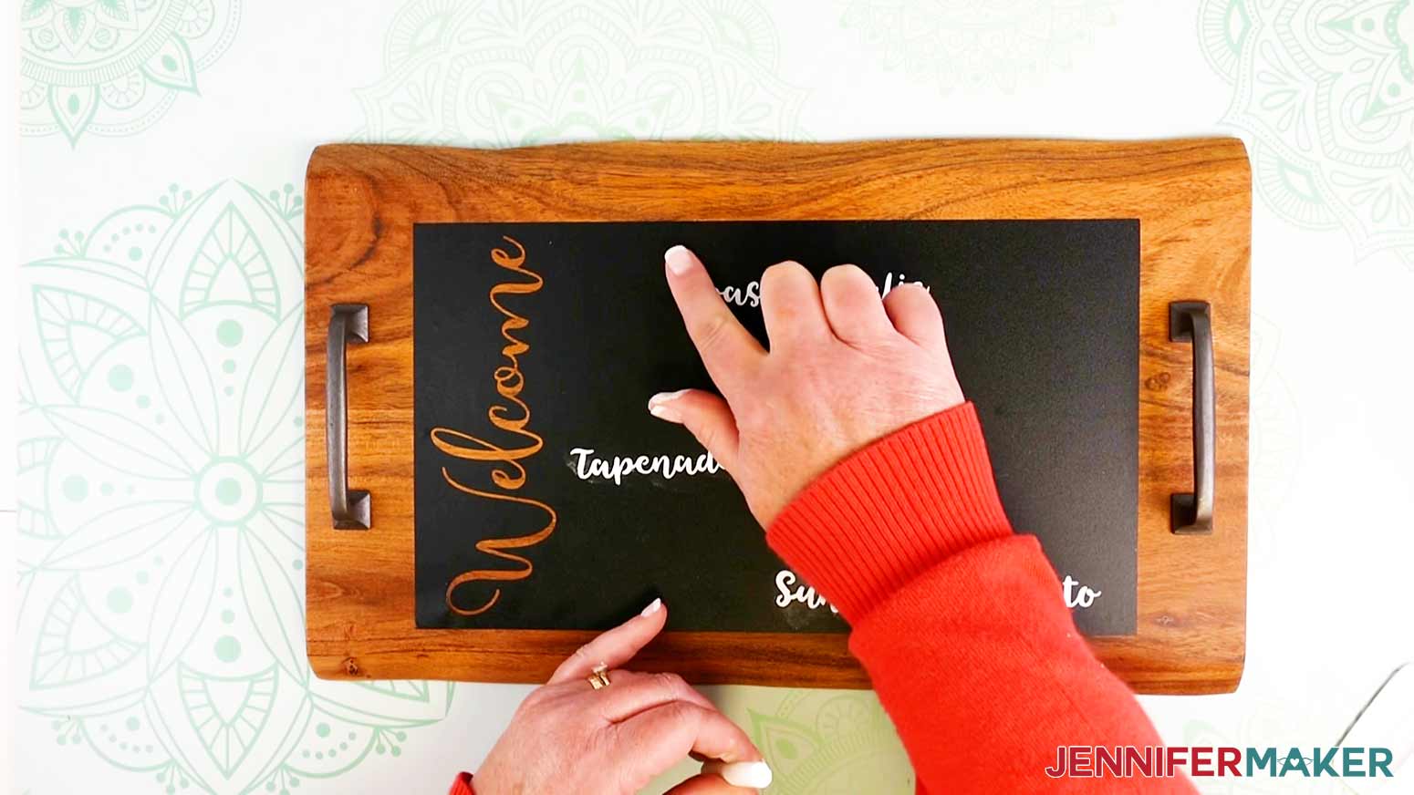 Chalking around the vinyl words on the Charcuterie Trays