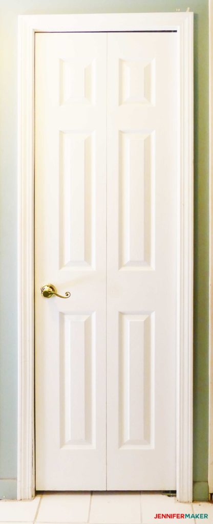 Converted bifold closet door into a regular door with a dummy scroll lever handle