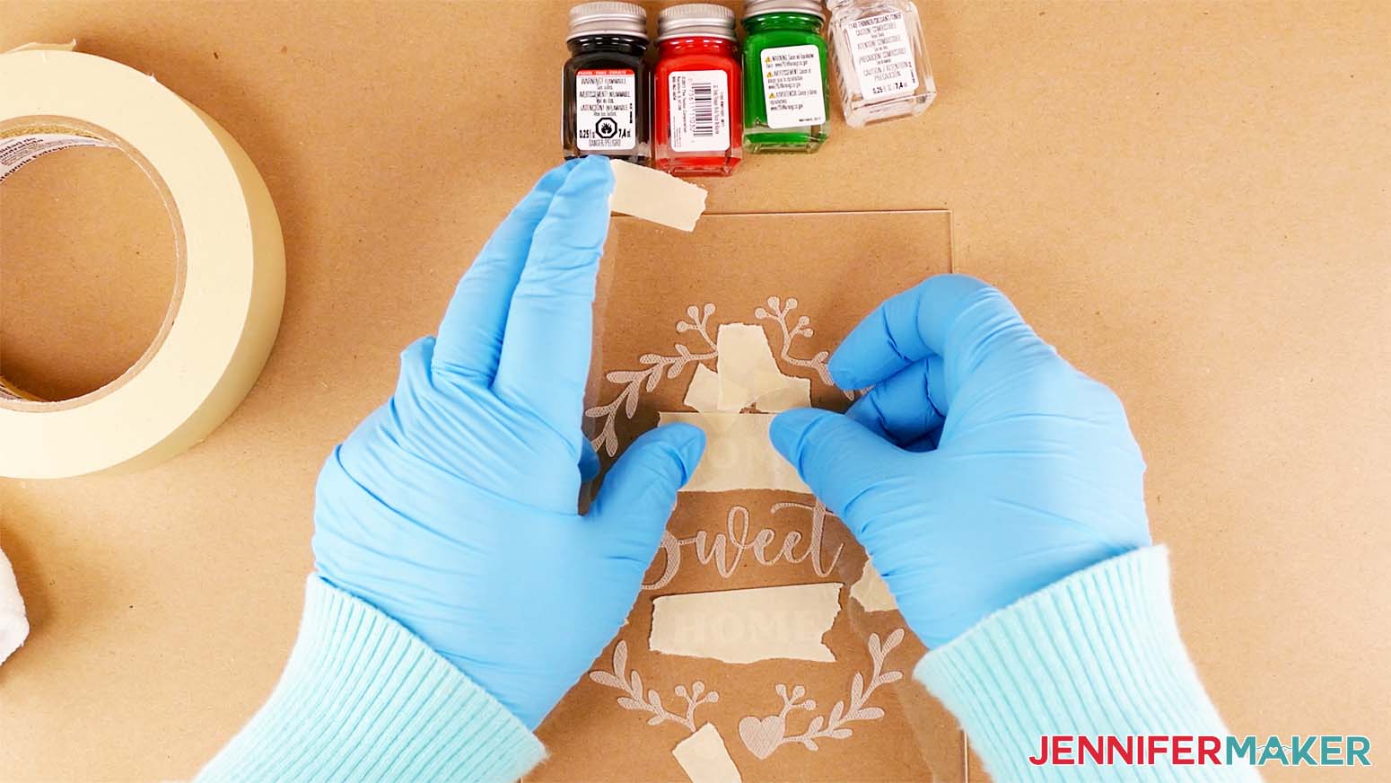 Cover the parts of your color engraving design that you don't want to color with painter's tape or masking tape