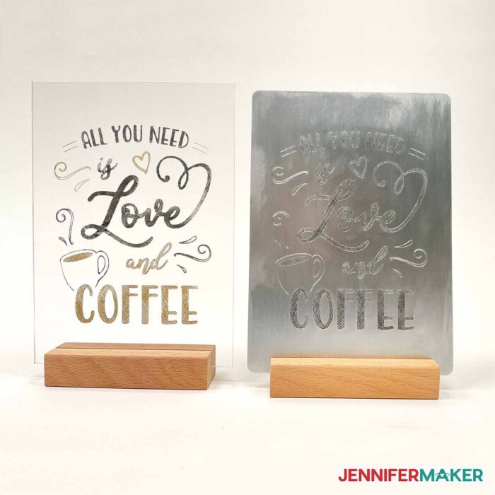 Comparison of Rub n Buff wax color engraving Love and Coffee design on a clear acrylic plaque and metal version in wooden stands.