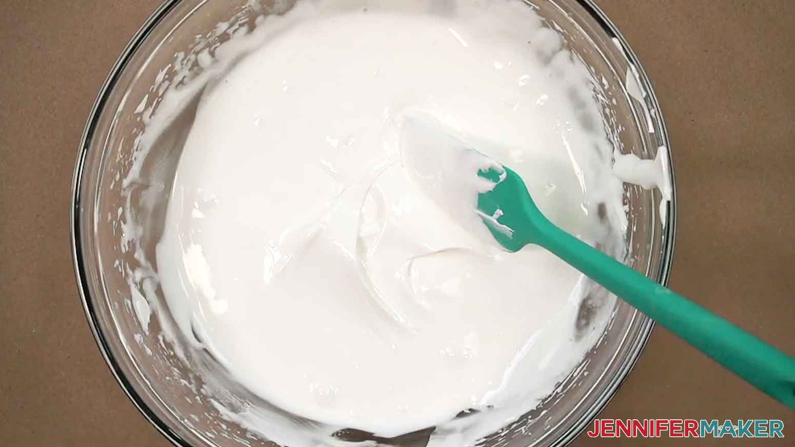 The icing has been mixed to the flood consistency which is thinner than the outline icing.