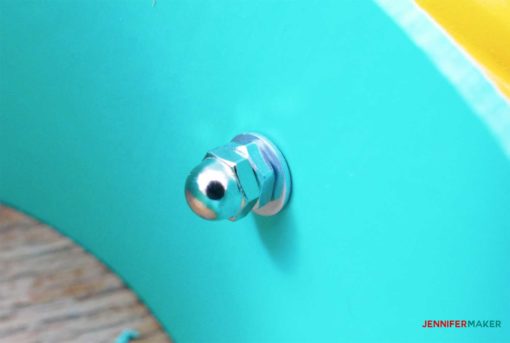 washer and nut on the end of the machine screw in the blue pvc pipe