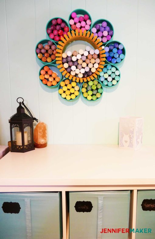 Colorful craft paint storage organizer made from PVC pipes and a duct collar -- click to see the full tutorial! #craftroom #organization #storage