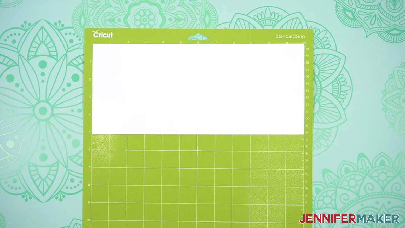 White writable label on a green machine mat.